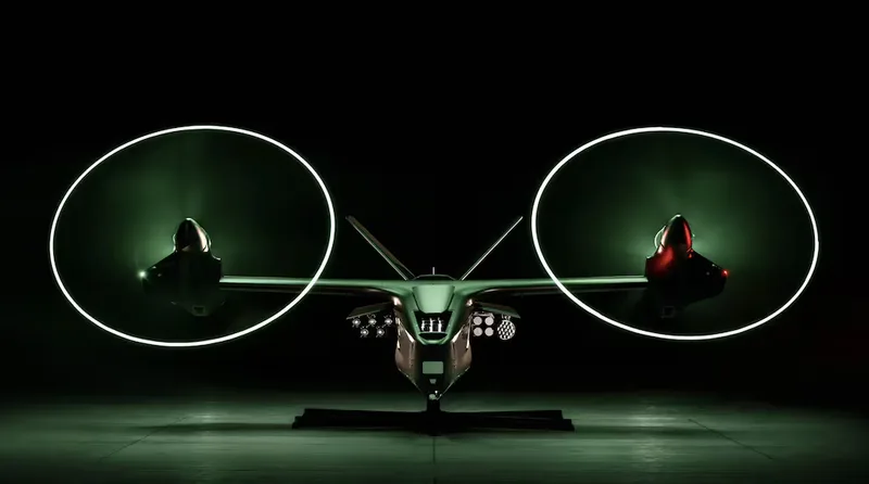 Anduril Thunder Kipprotor-Drohne mit Raketenbehältern in einer Halle, beleuchtete Rotorblätter erzeugen kreisförmige Lichtspuren