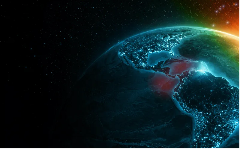 Digitale Grafik der Erde bei Nacht mit hellblauen Lichtpunkten an Küsten und rötlichen Zonen über Mittelamerika