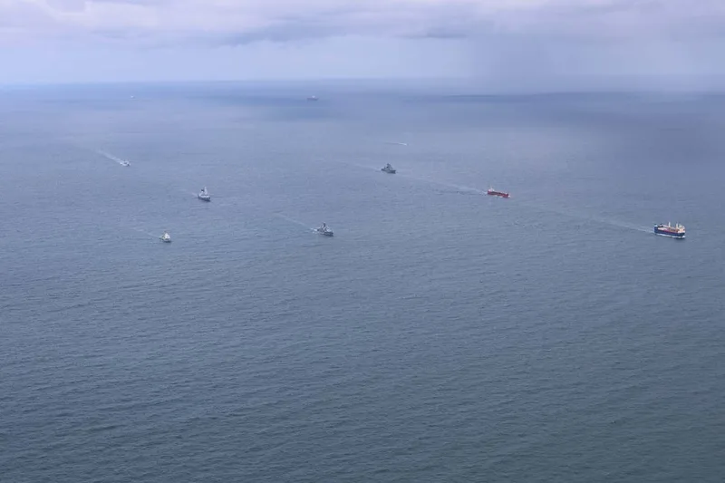 Three Royal Navy ships (from left, HM Ships St Albans, Severn, and Duncan) escort four Russian vessels (fourth in from left onwards, RFS Neustrashimiy, Admiral Levchenko, General Skobelev, and MV Sparta) through the North Sea and English Channel.