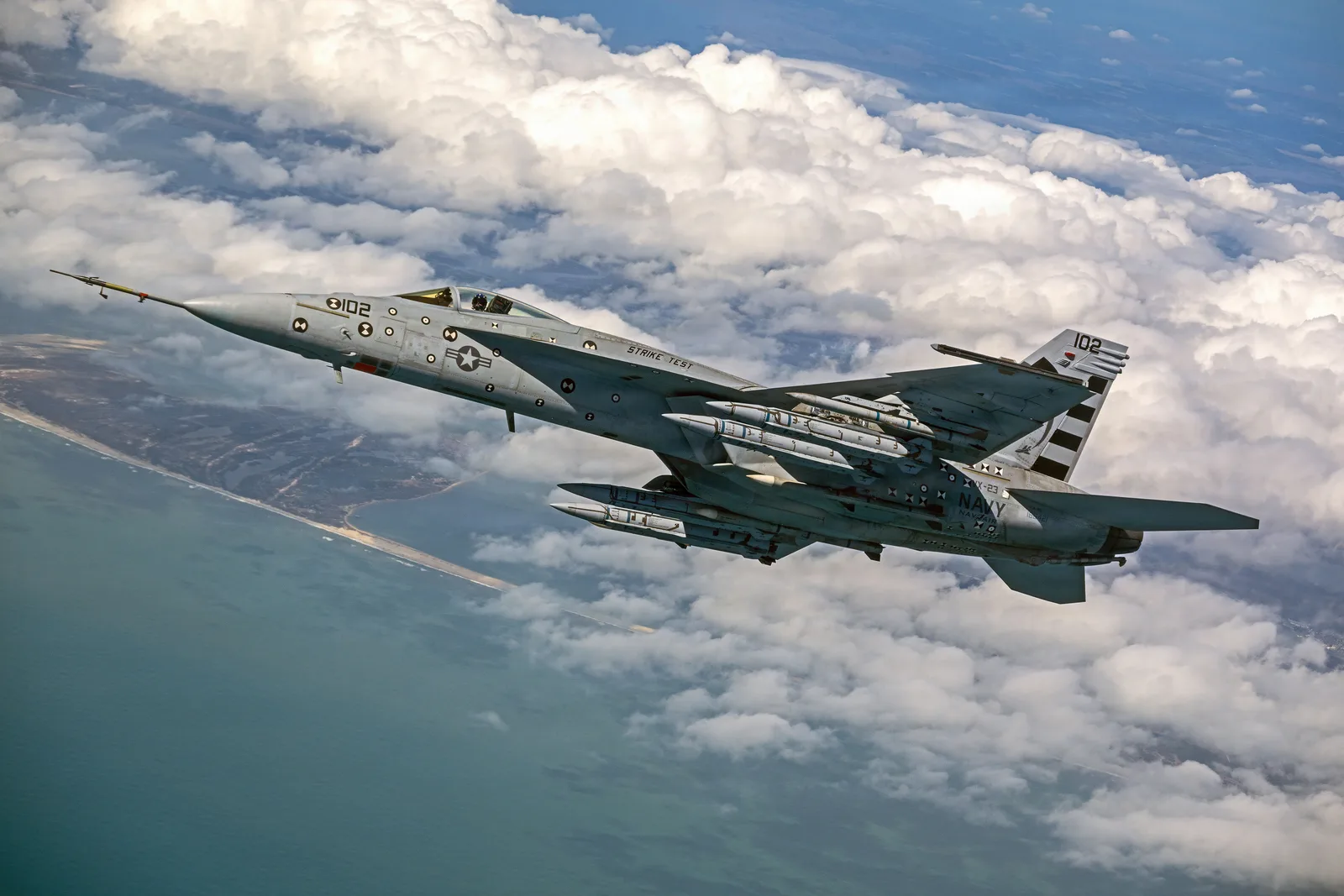The first of the Malice photos released by the US Navy appears to have been taken on 3 April 2026 and shows an F/A-18E Super Hornet of Navy Air Test and Evaluation Squadron 23 (VX-23) carrying four AIM-424 Long Range Air-to-Air Missiles underwing for an unspecified test event – probably a captive carry sortie. The aircraft also carries four AIM-120 AMRAAMs.