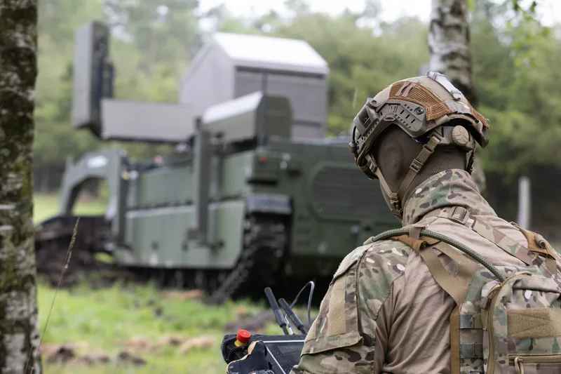 Pearson Engineering, Rheinmetall Landsysteme and DOK-ING and combined at the Eurosatory defence exhibition in Paris in June 2026 to unveil the world's first uncrewed mine-breaching system built on a latest-generation unmanned ground vehicle (UGV). Built on the DOK-ING Komodo MV-8 next-generation heavy-duty modular UGV, the system features Pearson Engineering’s RCV-Pioneer minefield breaching modular mission payload (MMP) incorporating its full width mine plough (FWMP) and lane marking system (LMS) technology. Pictured is the system being trialled in April 2026. (Pearson Engineering)