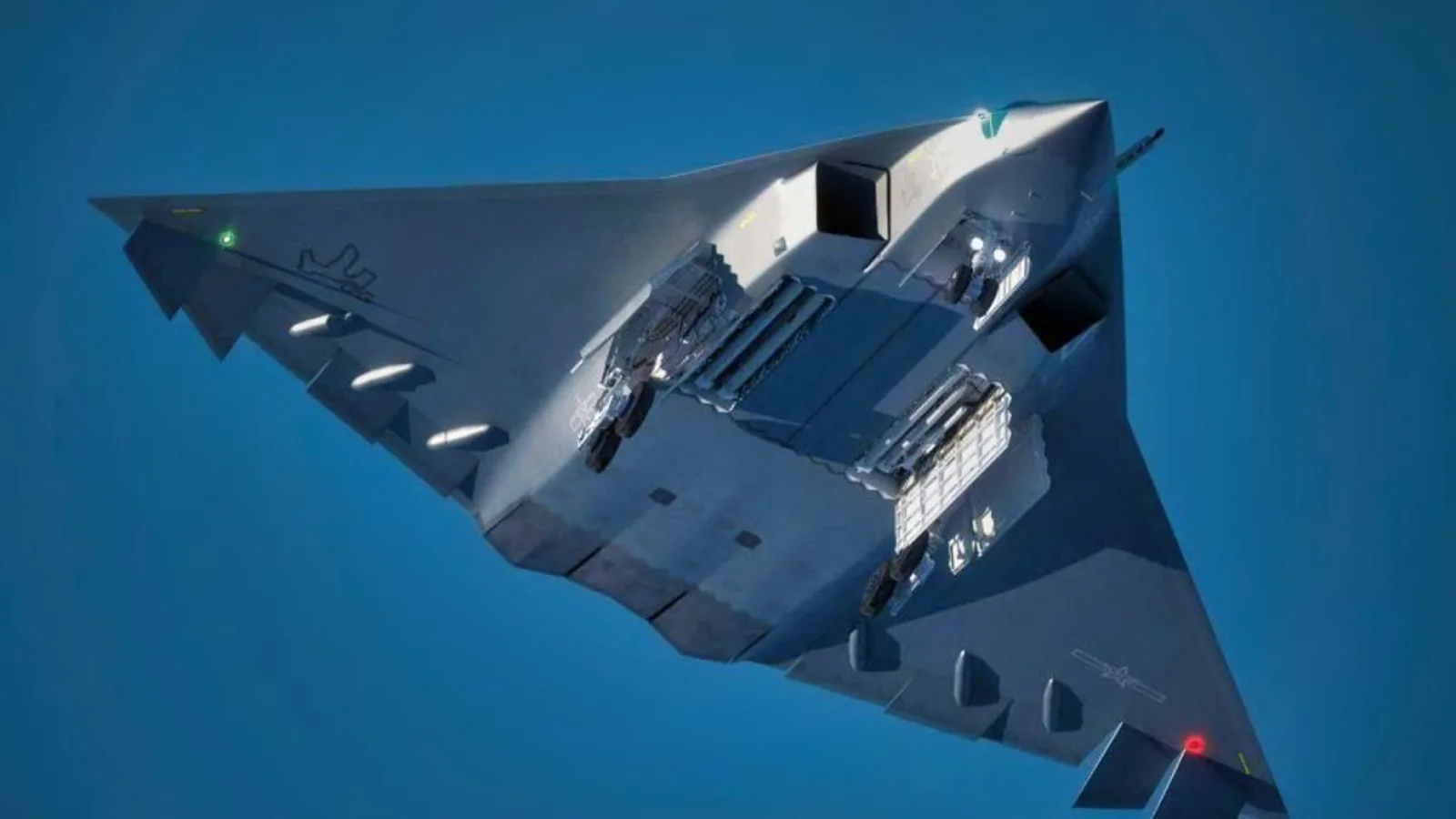 A frontal underside view of a J-36 fighter. While this particular airframe did not have a high-energy laser weapon fitted, it shows the available space on the underside of the aircraft.