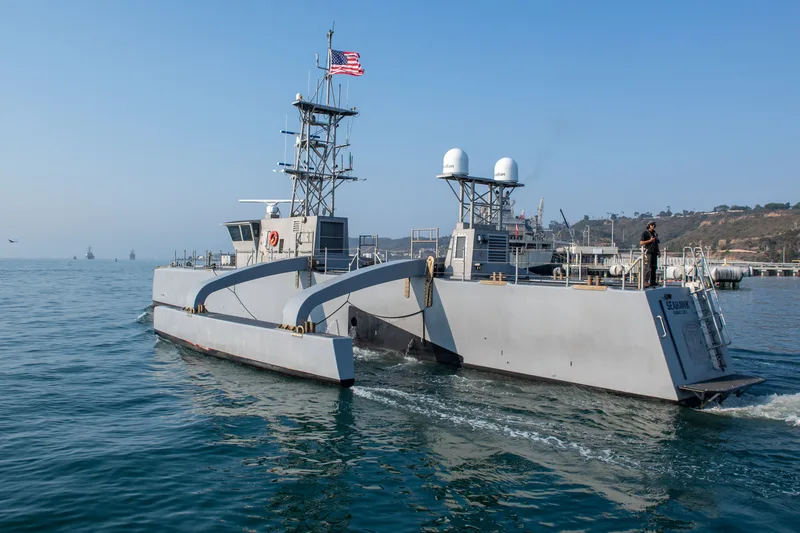 Seahawk, a Medium Unmanned Surface Vessel (MUSV) prototype, departs Naval Base Point Loma, California, 6 August 2025. As USVs increase in size and sophistication, they risk undermining their own cost asymmetry against traditional anti-ship weapons.