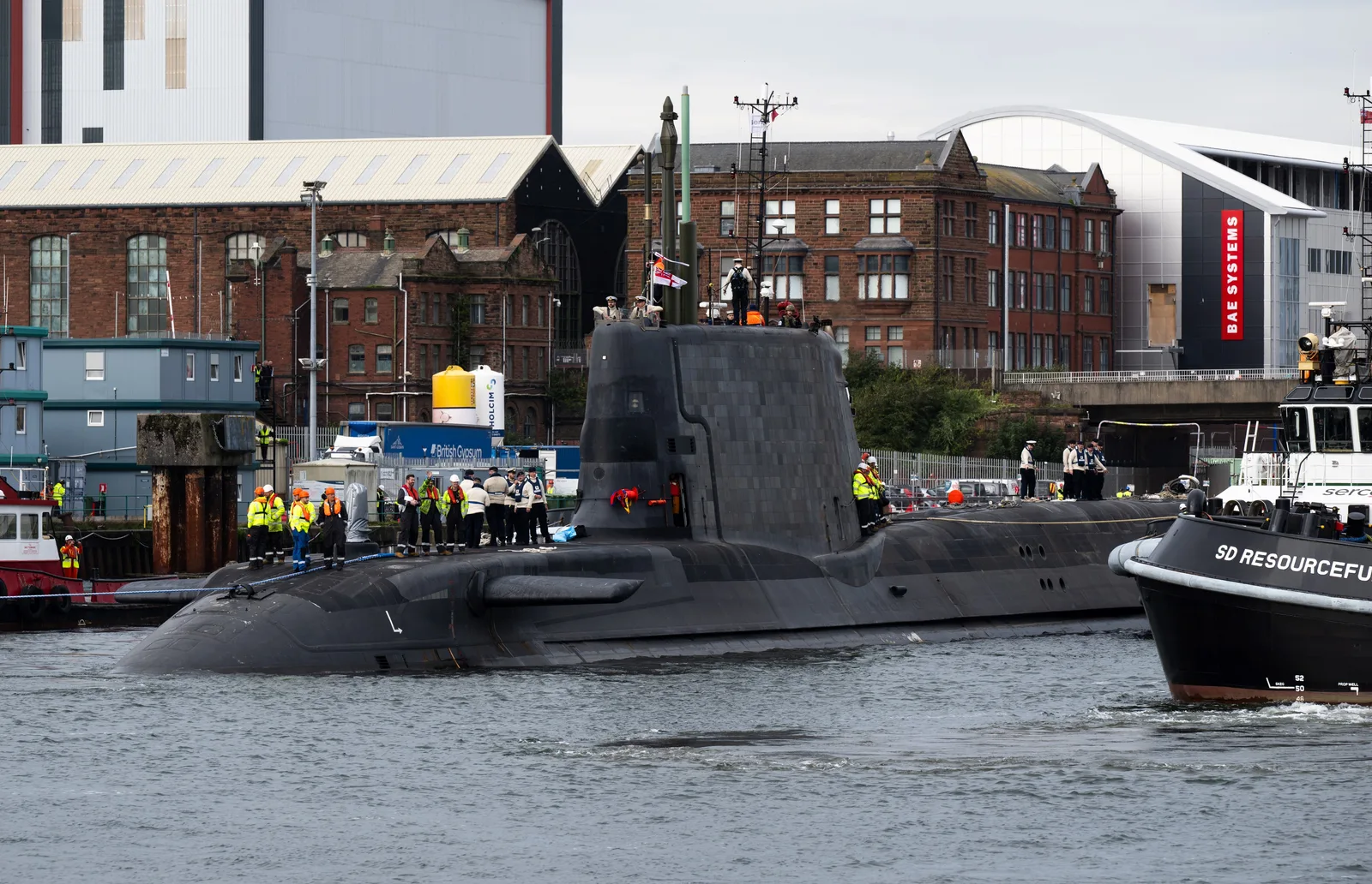 HMS Agamemnon, the sixth of seven Astute-class nuclear-powered attack submarine (SSN) to be operated by the Royal Navy, departing the BAE Systems shipyard in Barrow-in-Furness on 23 September 2026.