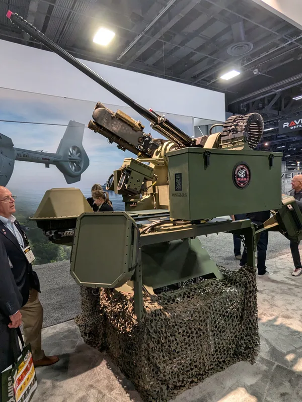 A sled-mounted Protector RS6 RWS, featuring a 30 mm cannon and C-UAS enabled with a radar, on the Kongsberg stand at AUSA 2026.